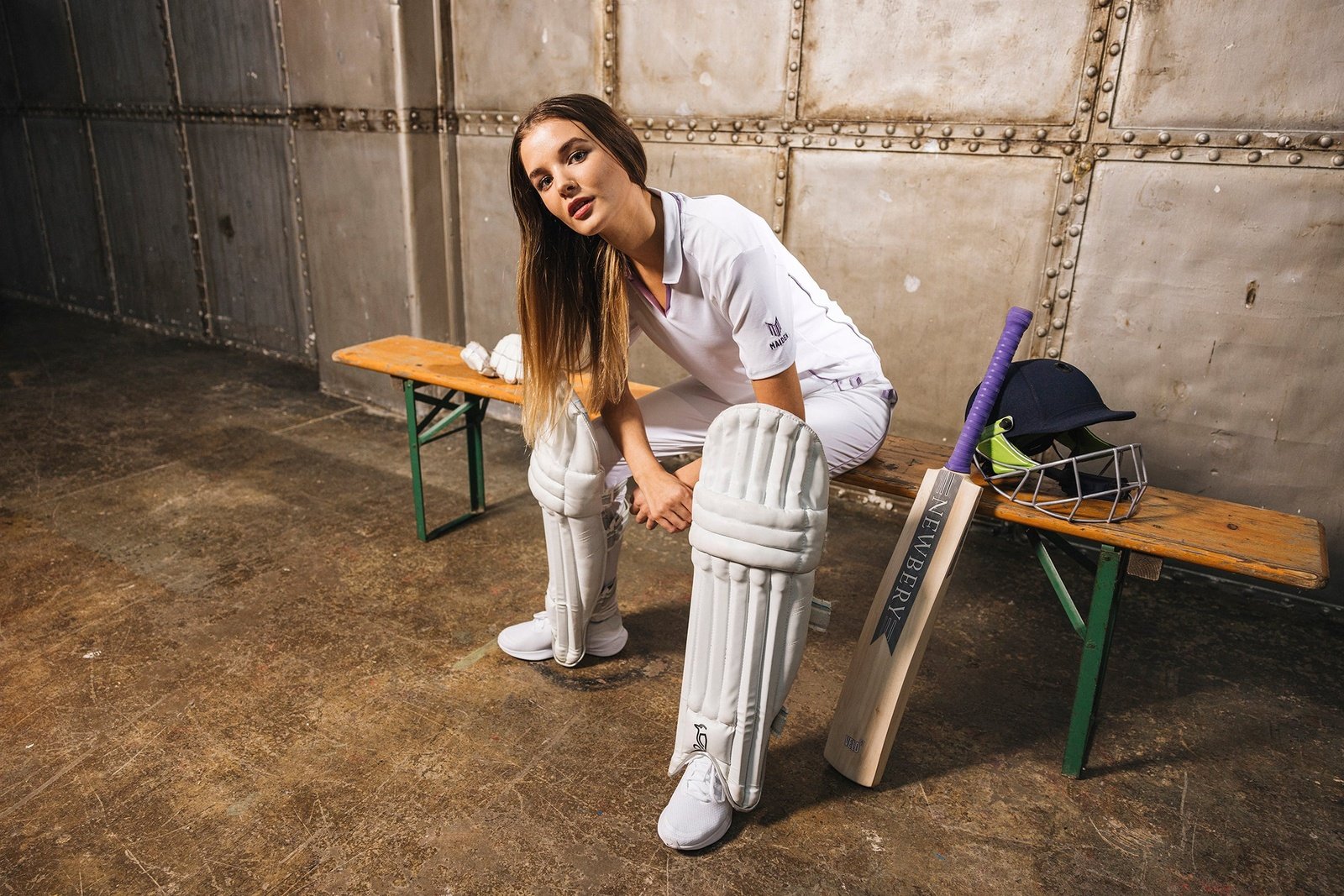 Women wearing Maiden Cricket clothing, smiling and showcasing stylish cricket gear for female athletes.