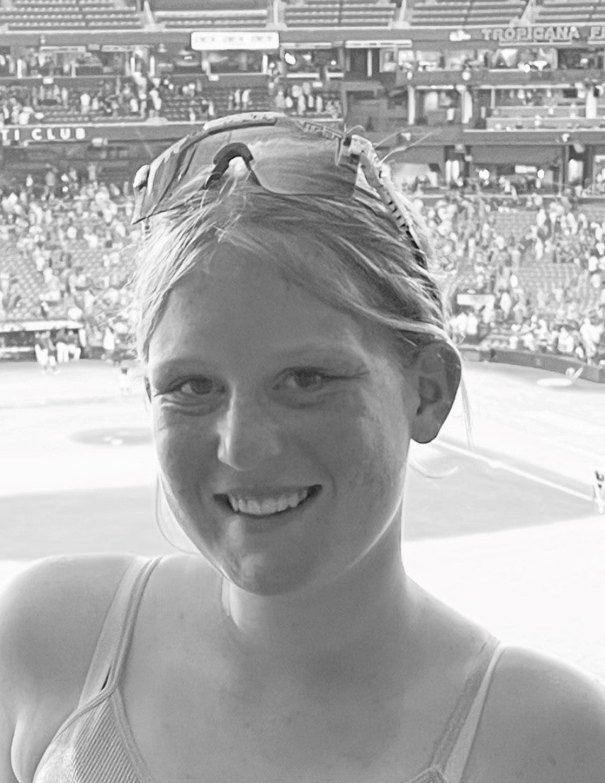 Erin, a rising star in women’s cricket, excelling in the sport.