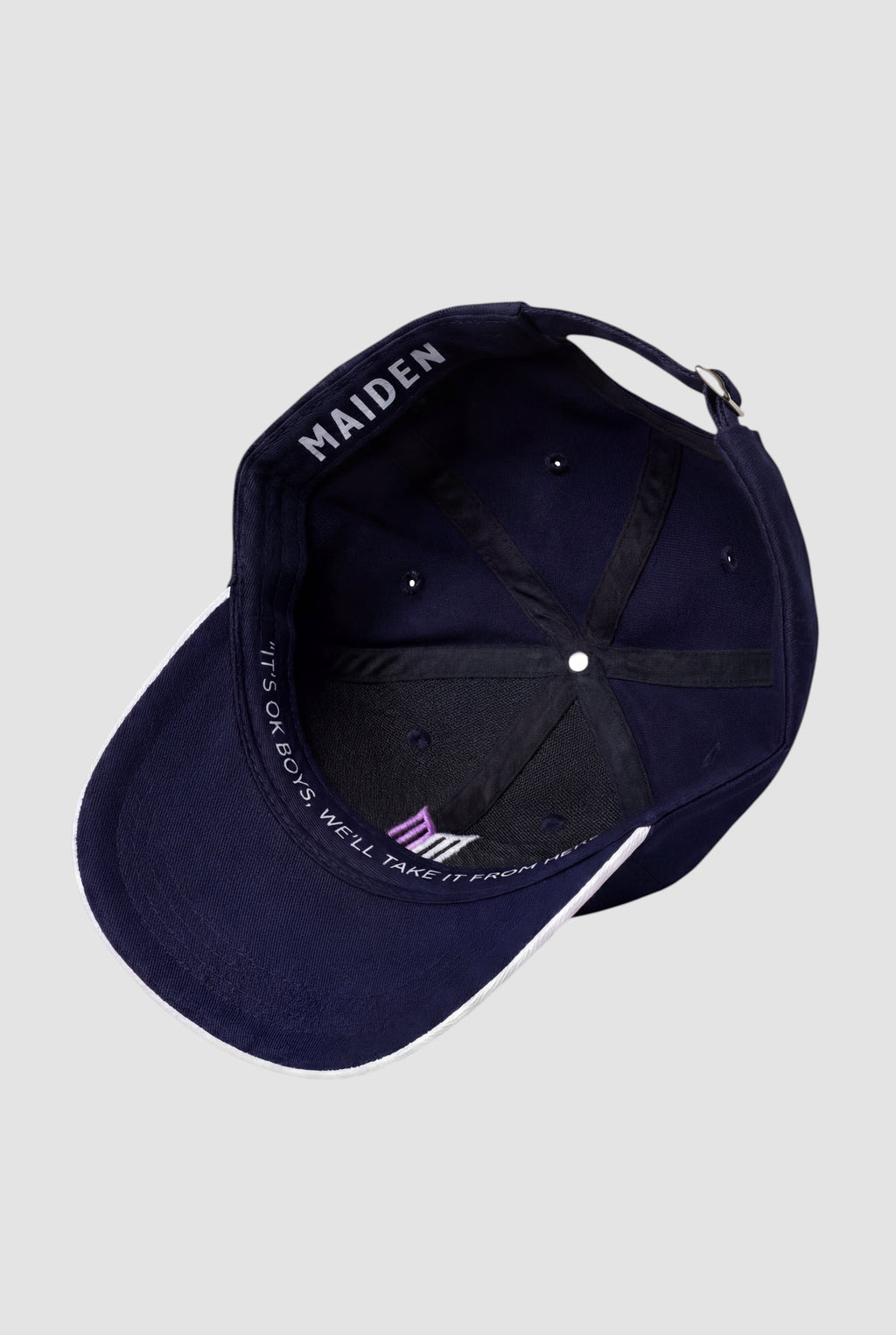 Maiden Cricket Beamer Cap in navy blue with white trim, featuring interior branding and an adjustable buckle strap.