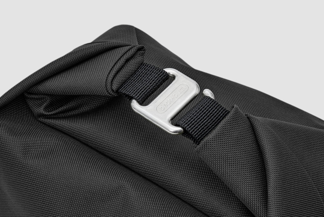 Maiden Cricket Black+Blum insulated lunch bag featuring a durable black recycled PET fabric and silver G-hook closure