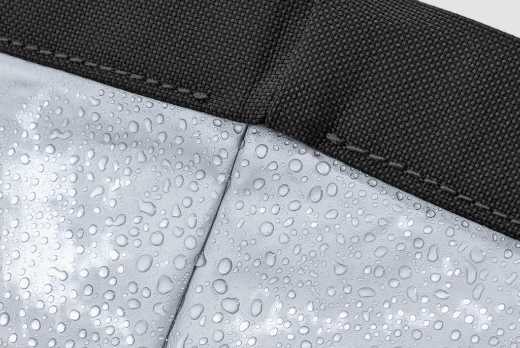 Close-up of the leak-proof, water-beaded interior lining of a Maiden Cricket x Black+Blum insulated lunch bag.