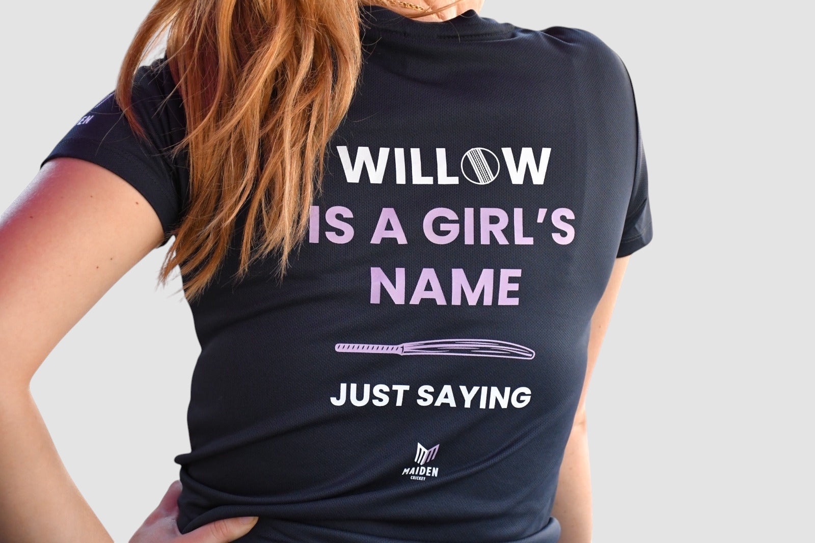 Maiden Cricket black women's cricket fan t-shirt with Willow Is A Girl's Name graphic print on the back.