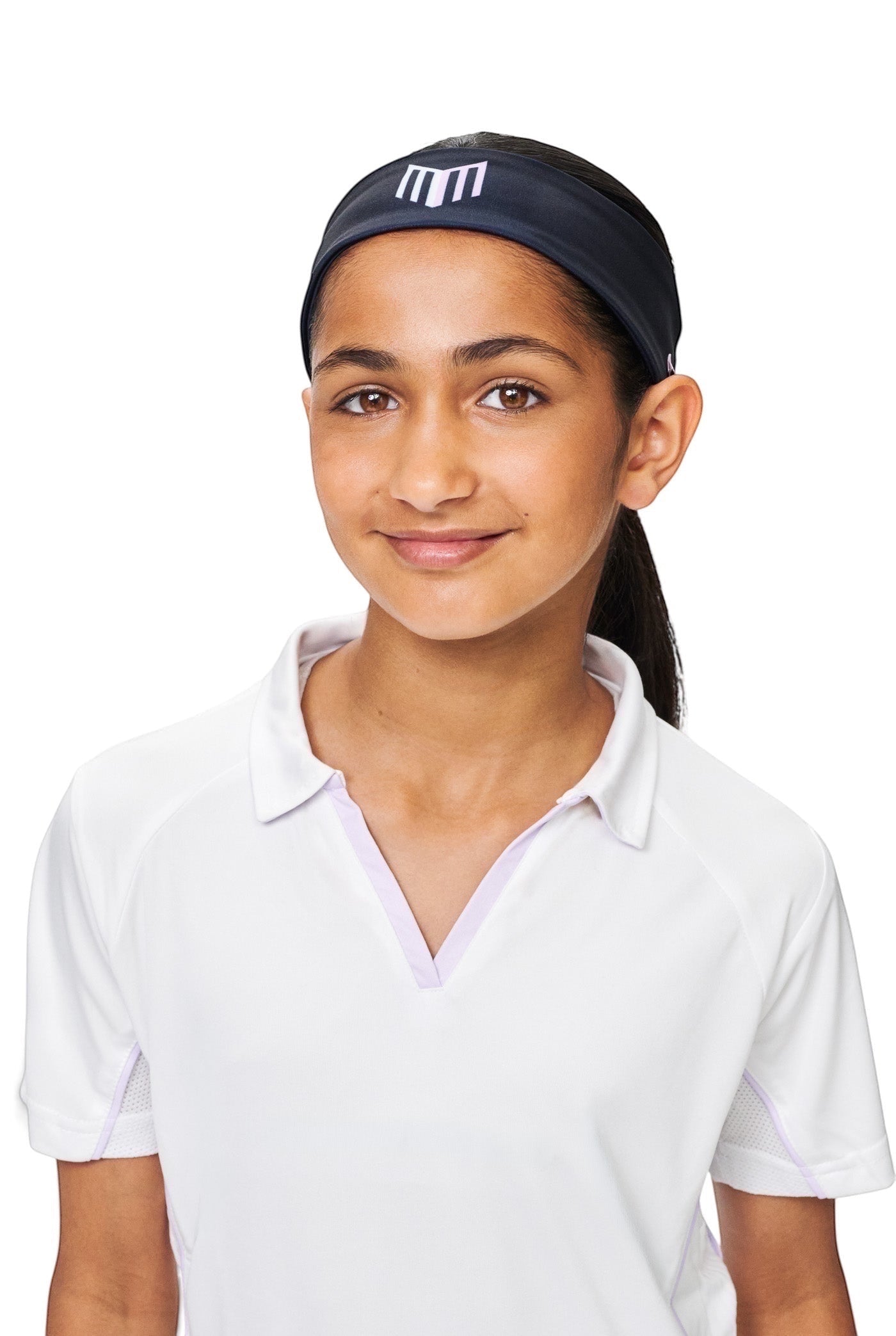 Young female cricketer wearing a black Maiden Cricket Bouncer Headband with a ponytail opening under a white shirt