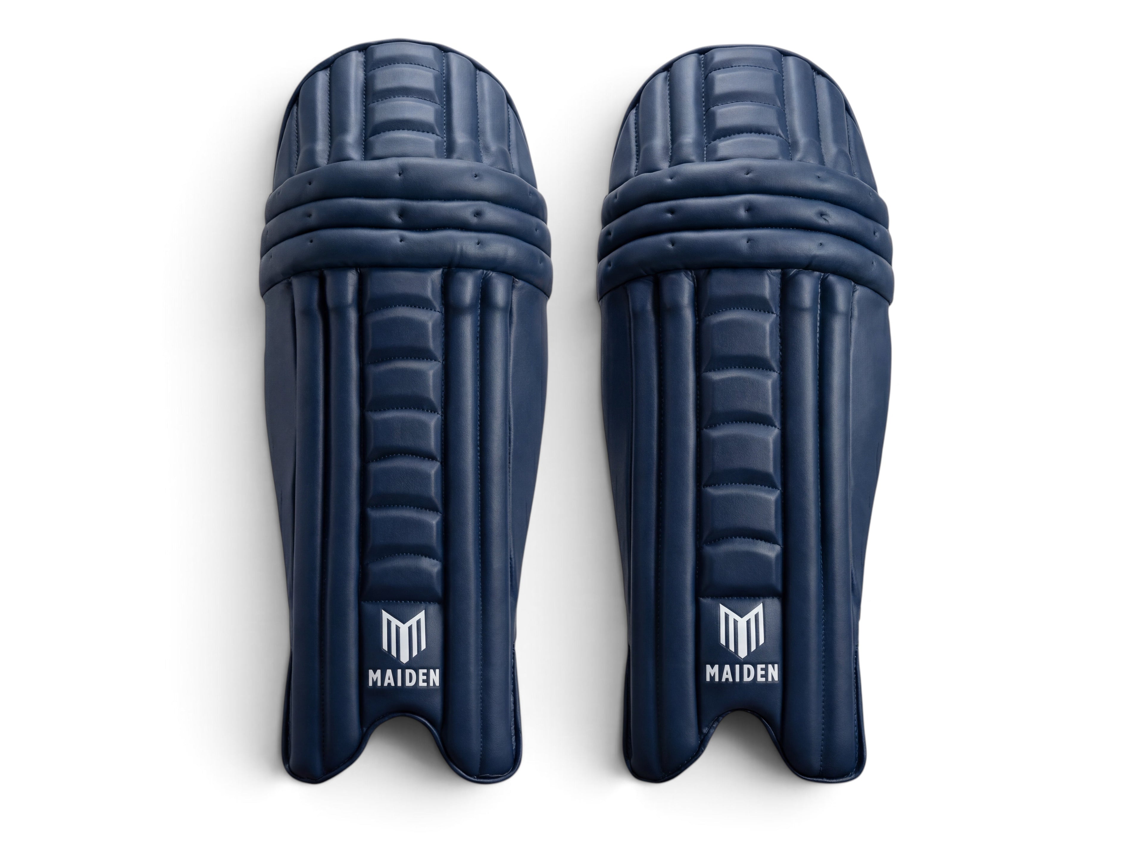 Maiden Cricket girls' navy batting pads with ergonomic knee curve and lightweight high-impact protection