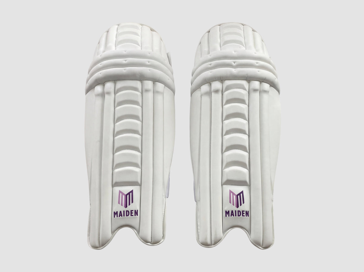 Maiden Cricket girls' white batting pads with ergonomic knee curve and lightweight high-impact front armour