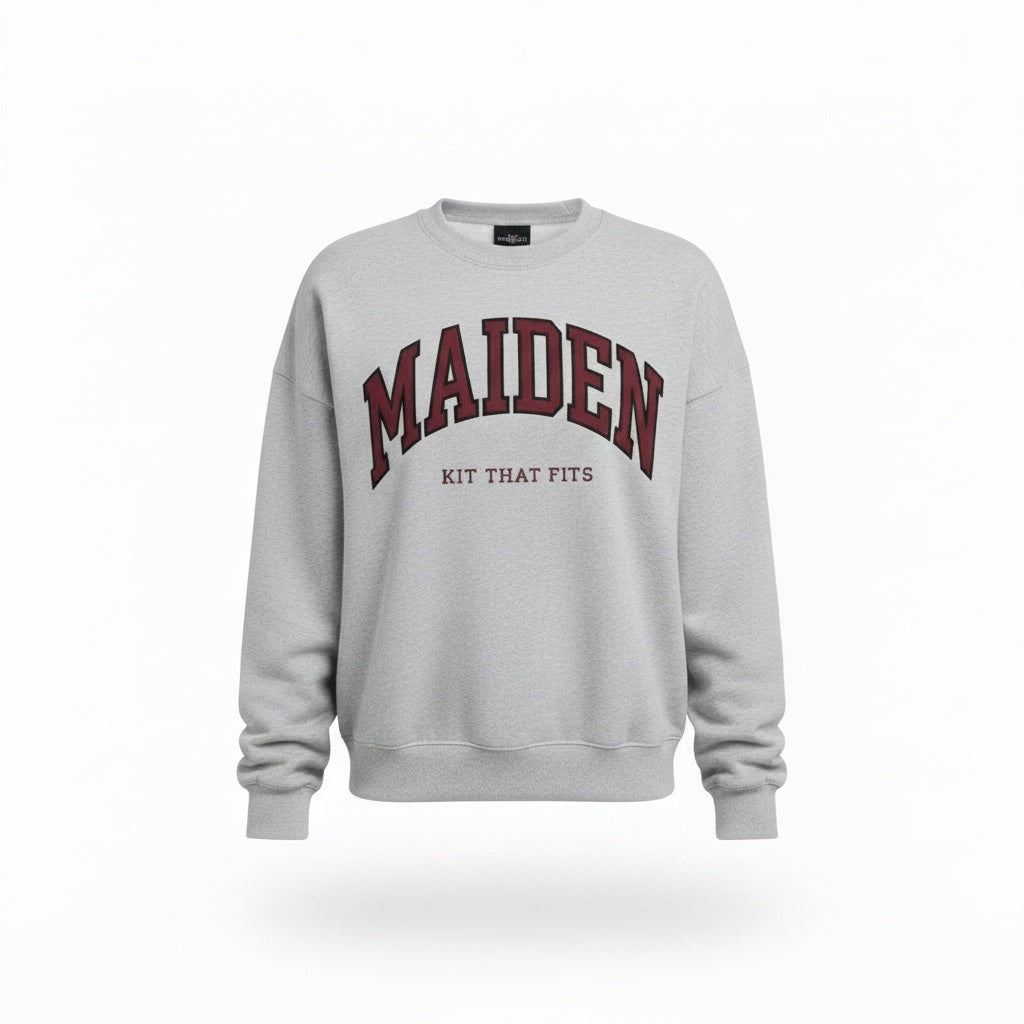 Maiden Cricket heather grey crewneck sweatshirt with maroon and black collegiate graphic text on the chest.