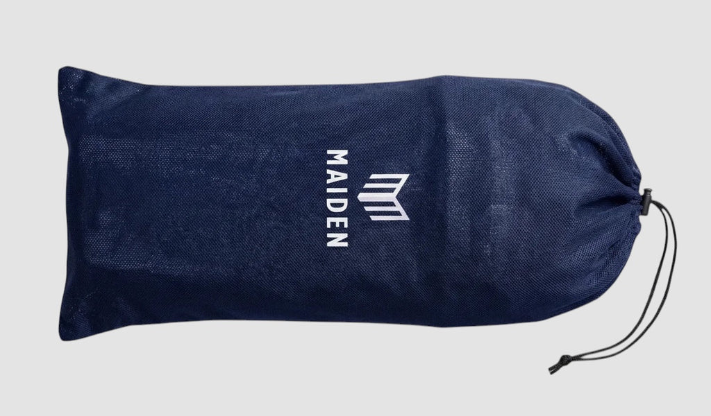 Maiden Cricket navy blue drawstring storage bag for girls' batting pads with white brand logo