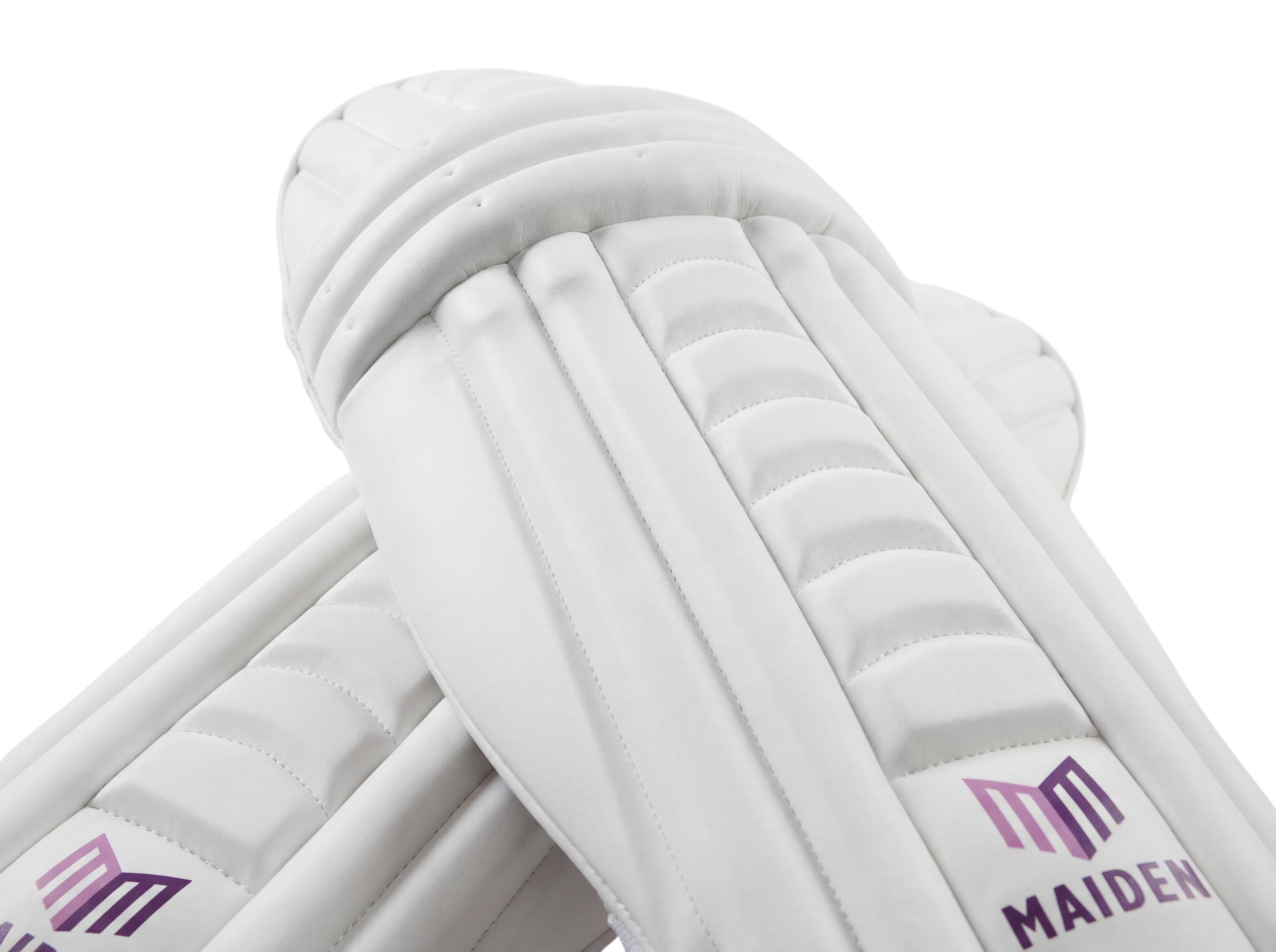 Maiden Cricket women's white batting pads with ergonomic knee curve and lightweight high-impact protective armour