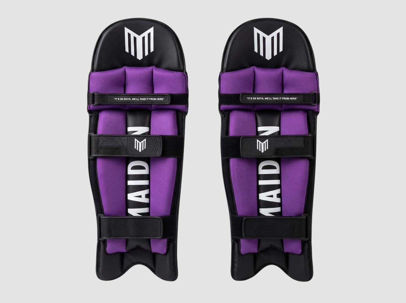 Maiden Cricket women's black and purple batting pads with ergonomic knee design and secure straps for a custom fit.