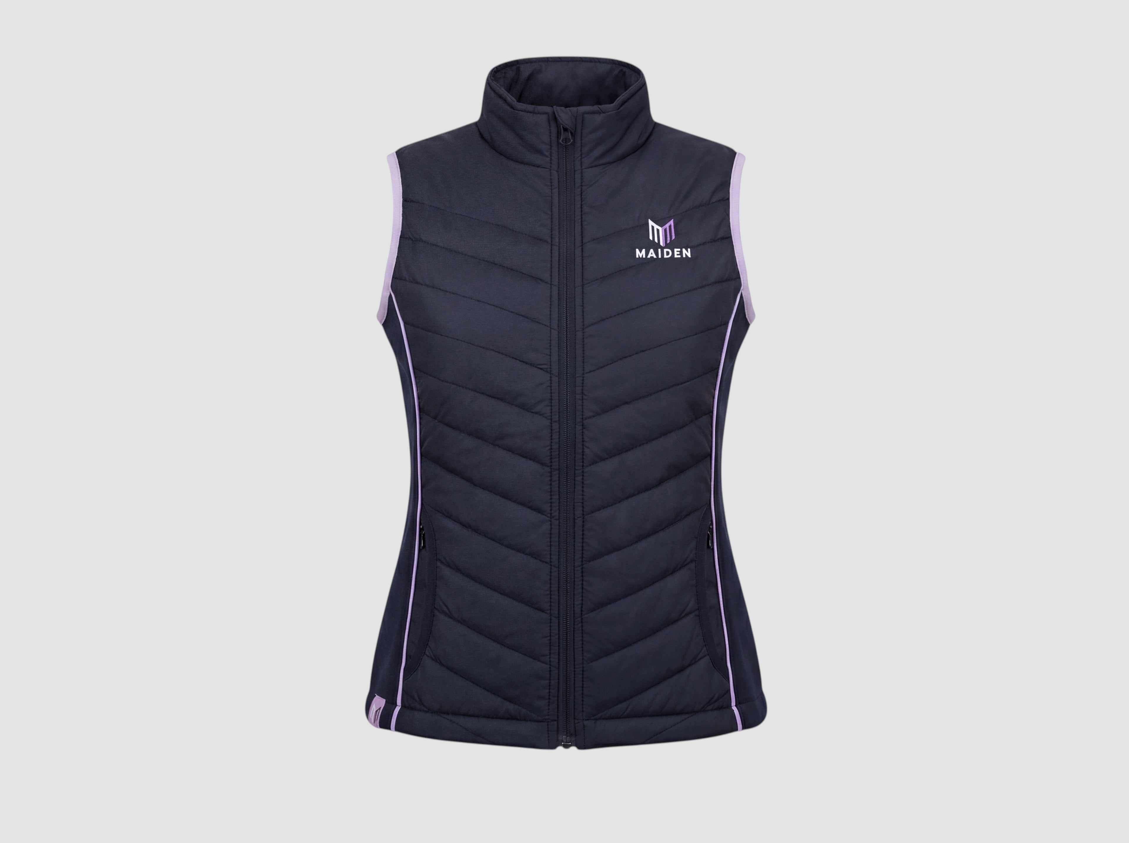 Maiden Cricket Yorker Gilet for women in navy blue with light purple trim, featuring a zip-up front and logo.